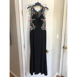 Black full-length prom dress with embroidery